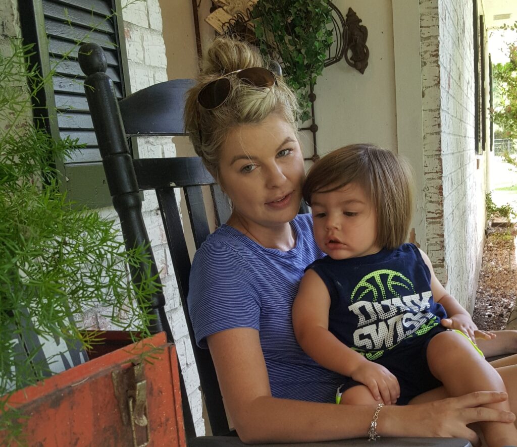 The Hagan Homestead porch sitting with kids